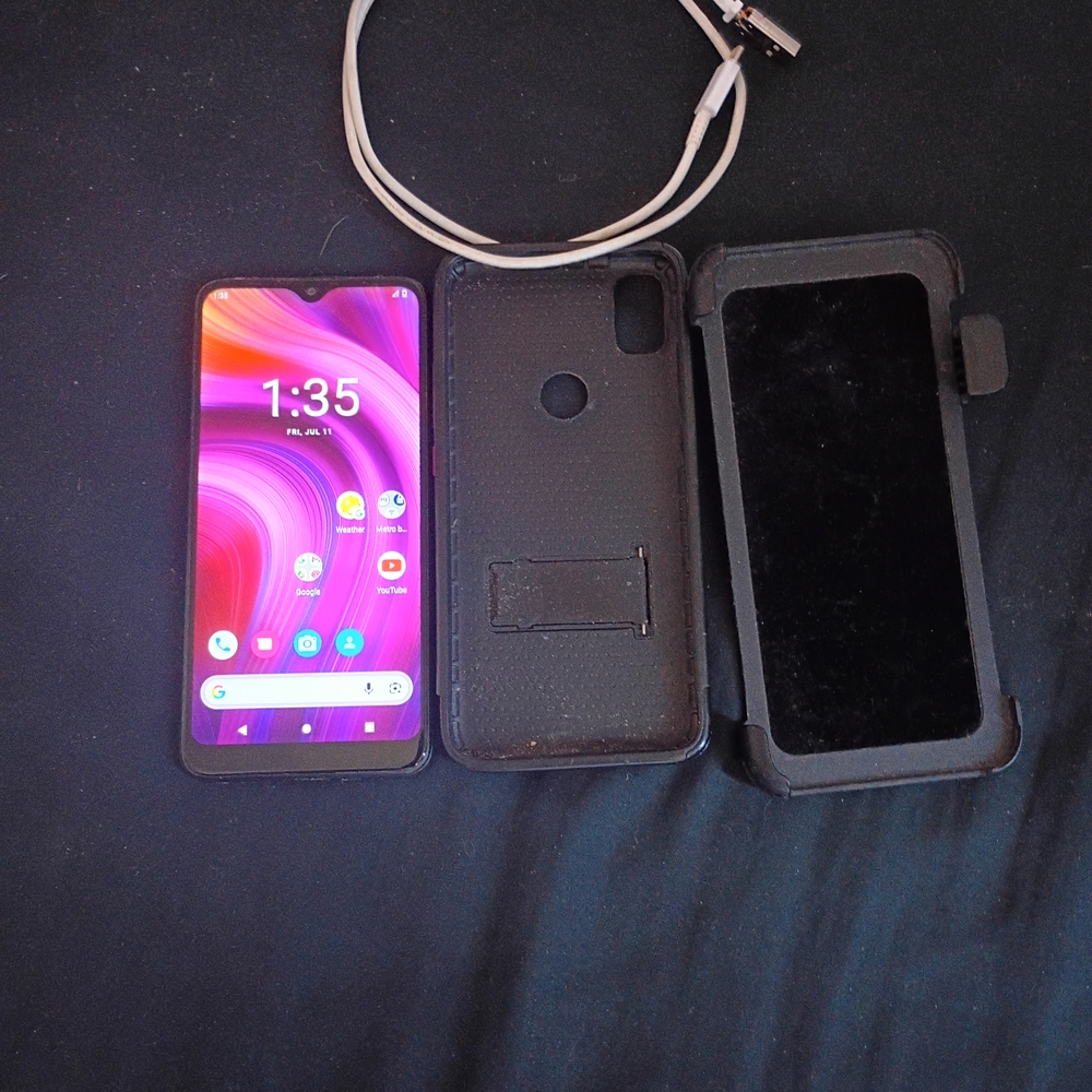 Black T-Moble Revvl 4
